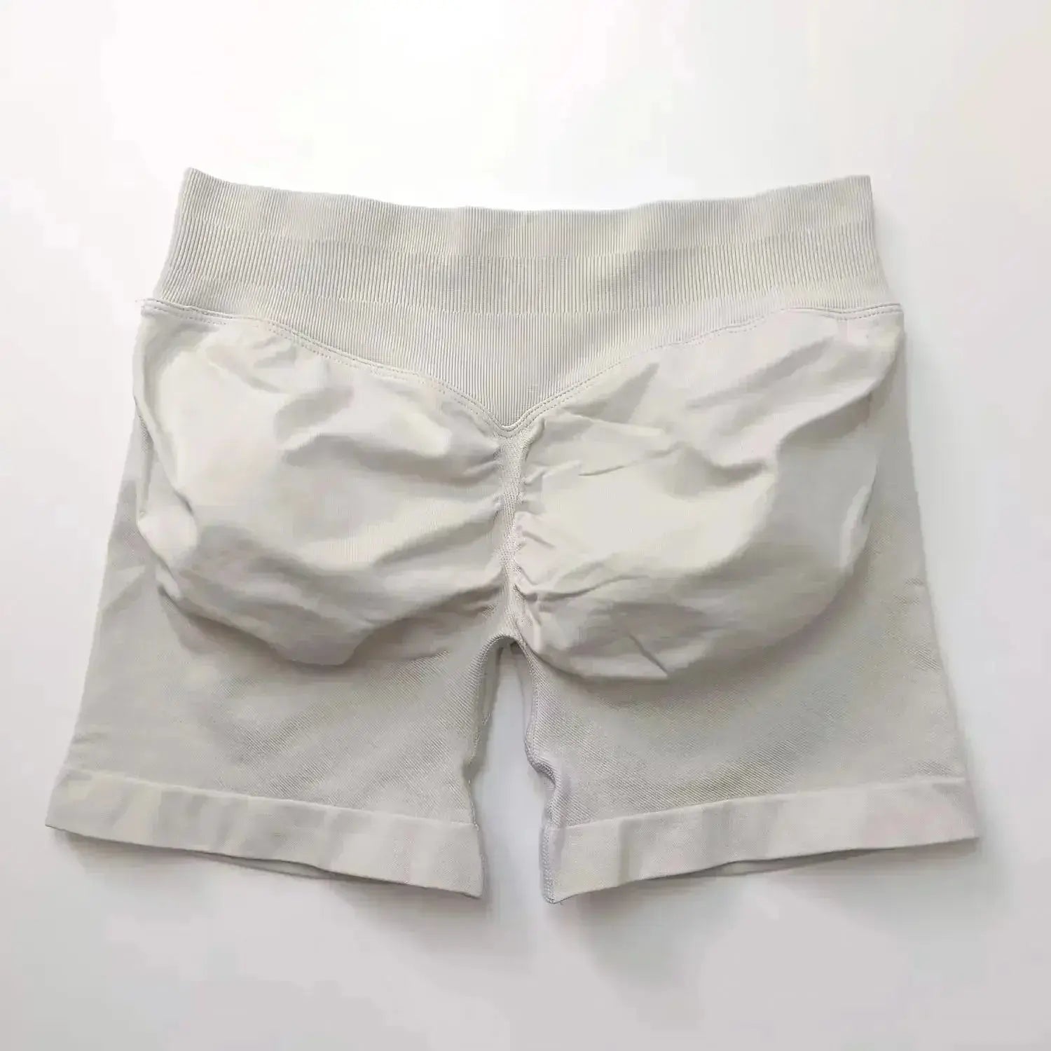 Women's seamless scrunch butt gym shorts by NCLAGEN Gym Wear, designed for high-performance fitness and yoga activities.