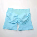 Women's seamless scrunch butt gym shorts for fitness and yoga, designed for high-performance workouts, by NCLAGEN Gym Wear.
