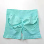 Women's seamless scrunch butt gym shorts for high-performance fitness and yoga, designed for a flattering fit and comfort.