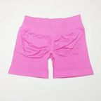 Women's seamless gym shorts with scrunch butt design, ideal for high-performance fitness and yoga by NCLAGEN Gym Wear.