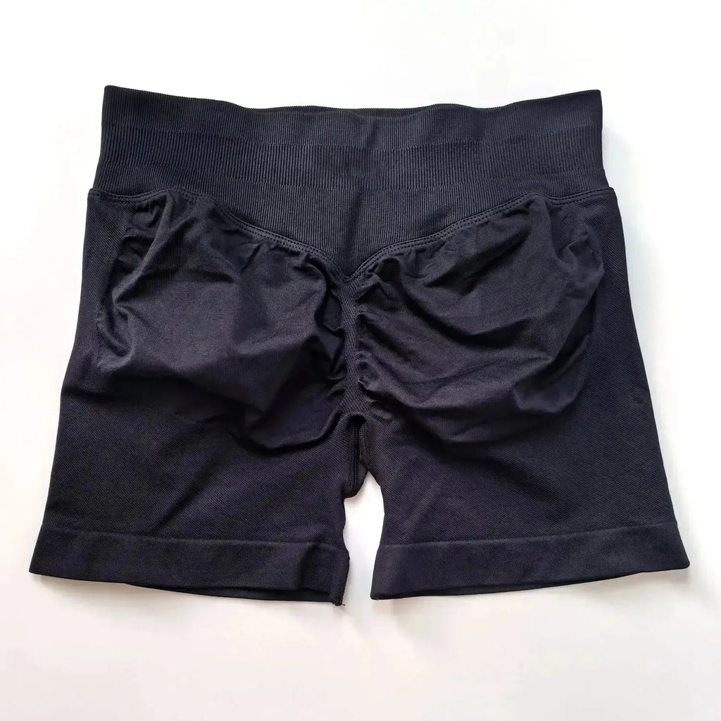 Women's seamless scrunch butt gym shorts by NCLAGEN Gym Wear, designed for high-performance fitness and yoga activities.