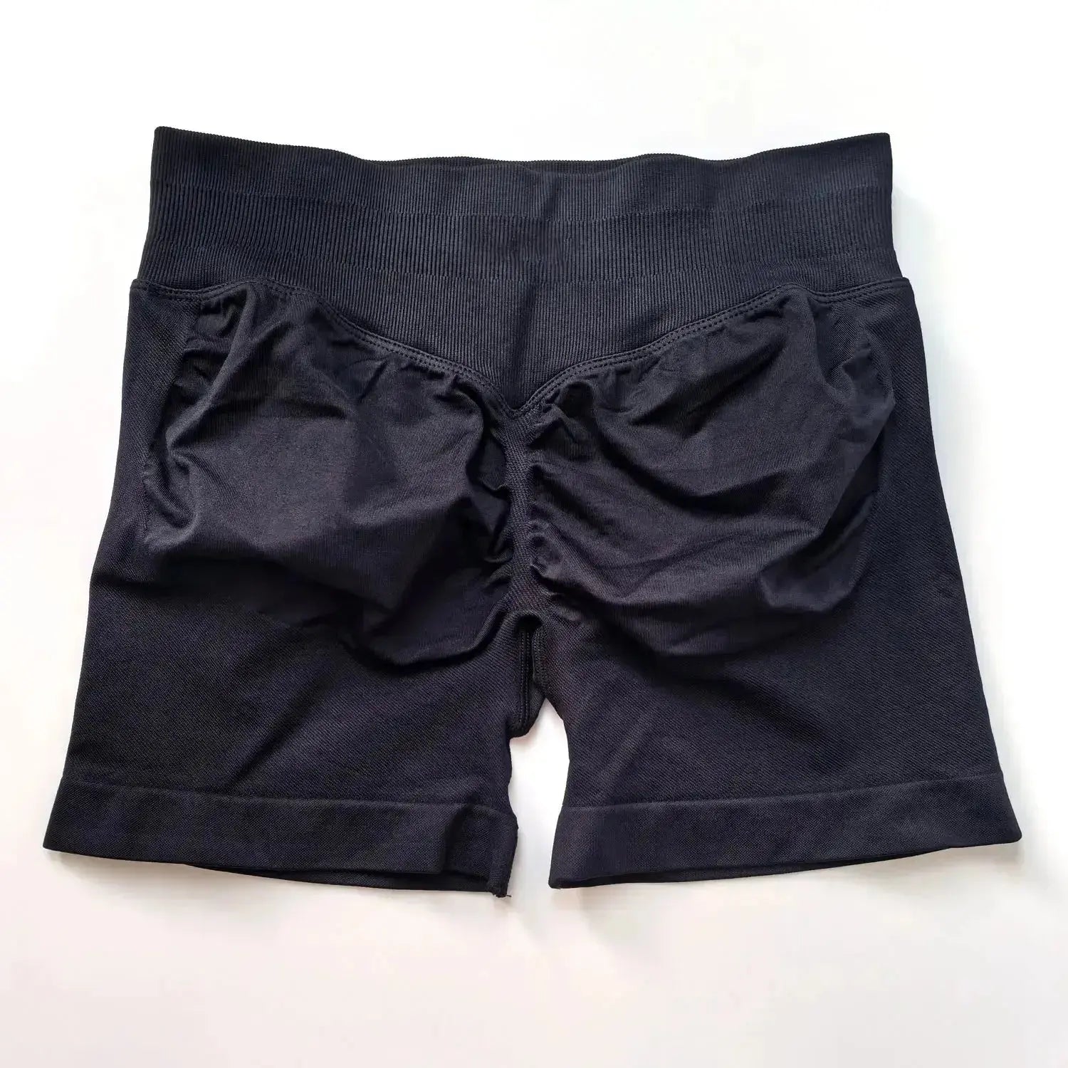 Women's seamless scrunch butt gym shorts for high-performance fitness and yoga from NCLAGEN Gym Wear, showcasing a fitted athletic design.
