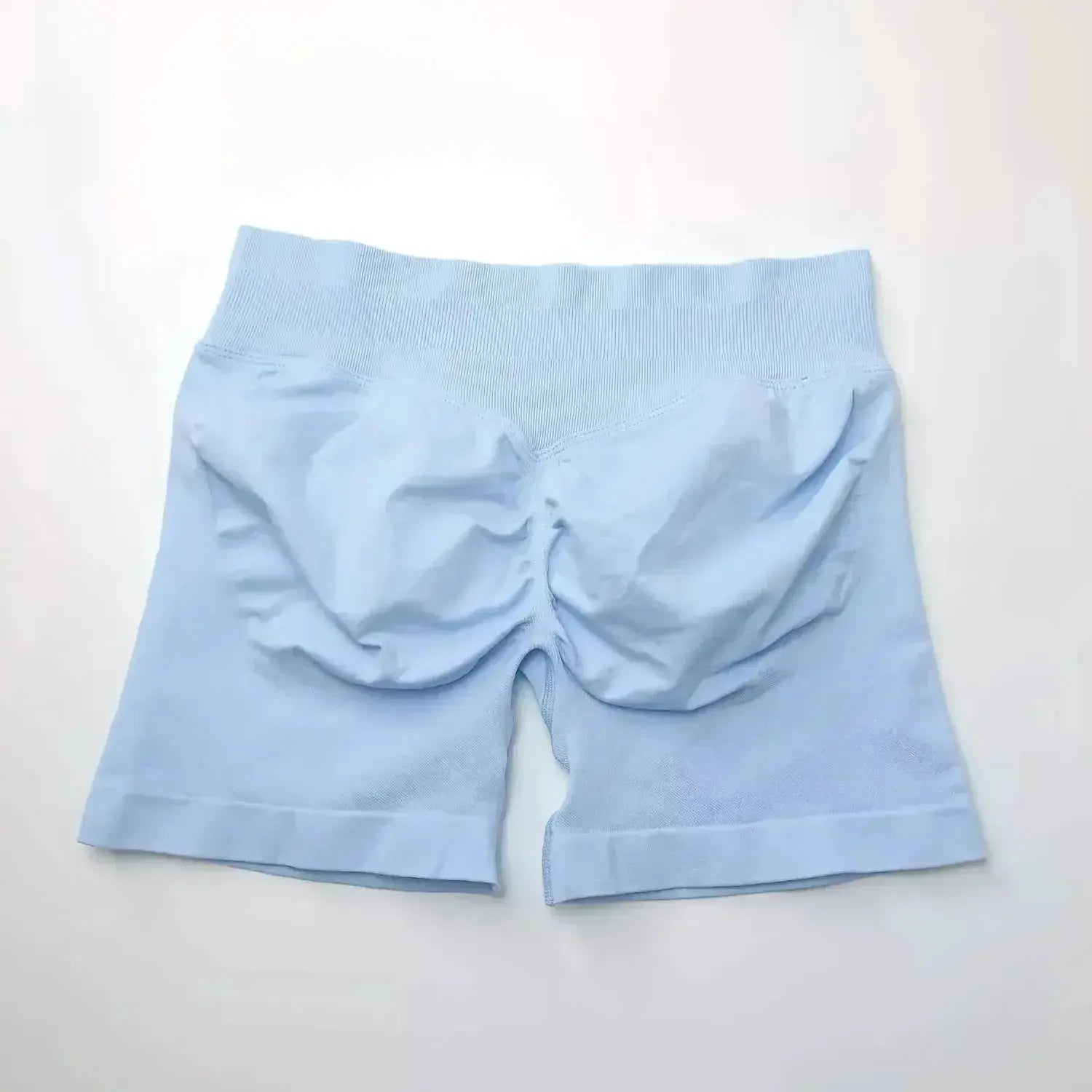 Women's seamless scrunch butt gym shorts for high-performance fitness and yoga by NCLAGEN Gym Wear, designed for comfort and style.