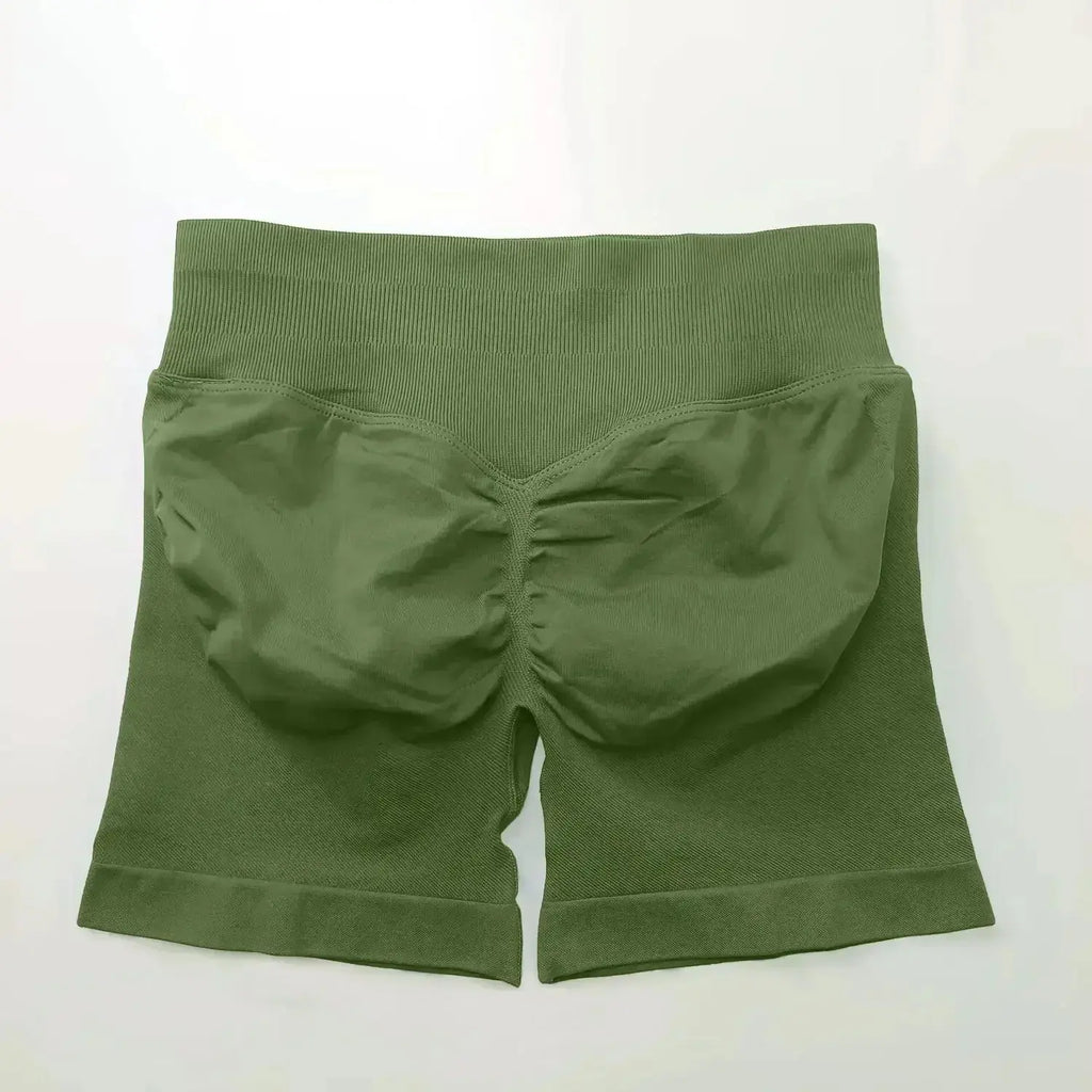 Women's seamless scrunch butt gym shorts for fitness and yoga, designed for flexible movement and high performance by NCLAGEN Gym Wear.