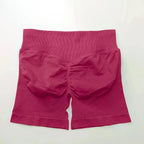 Women's seamless scrunch butt gym shorts for fitness and yoga, designed for high-performance workouts by NCLAGEN Gym Wear.