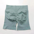 Women's seamless scrunch butt gym shorts for high-performance fitness and yoga, designed for comfort and style.