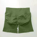 Women's seamless scrunch butt gym shorts for fitness and yoga by NCLAGEN Gym Wear, showcasing a high-performance athletic leggings design.