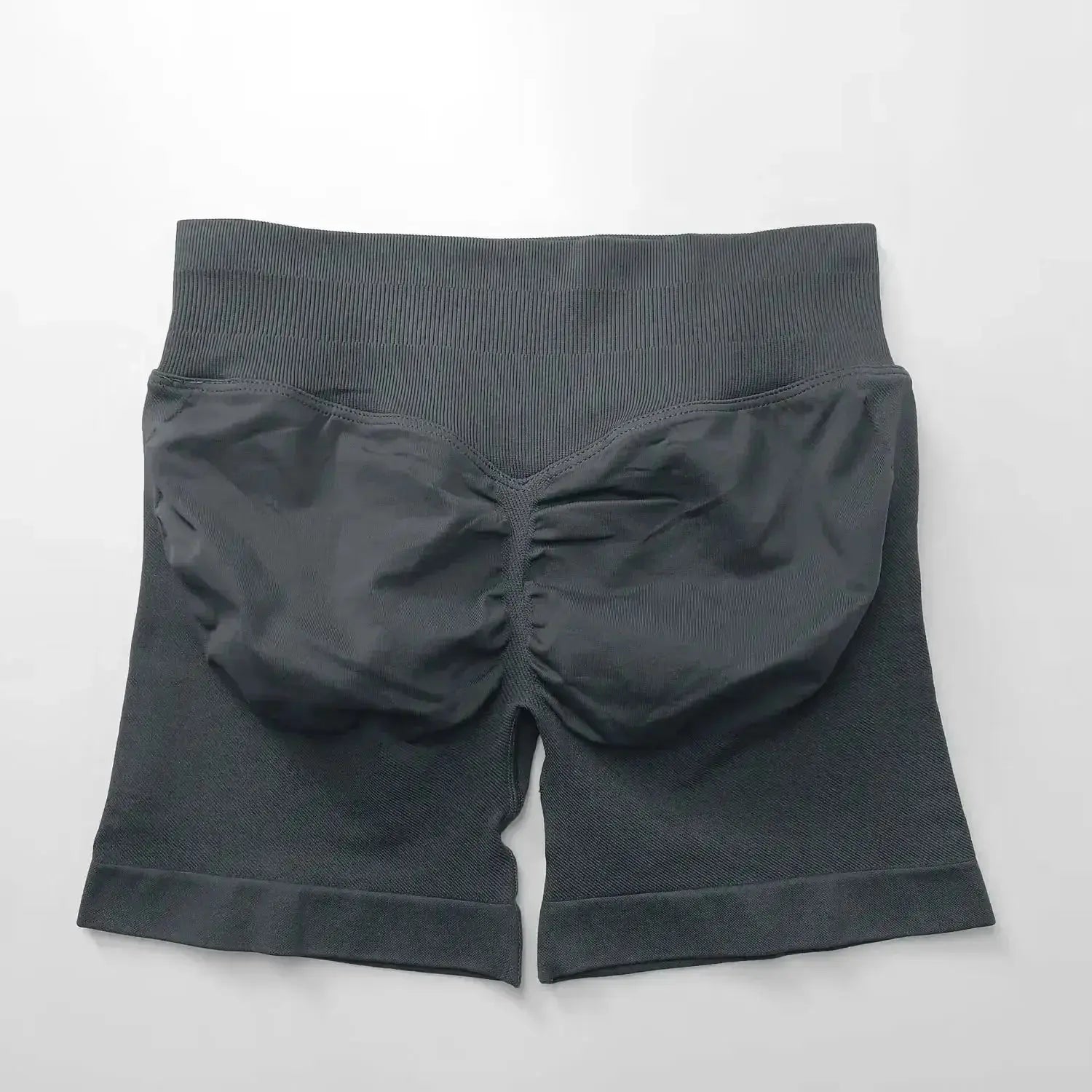 Women's seamless scrunch butt gym shorts for fitness and yoga, designed for comfort and high performance by NCLAGEN Gym Wear.