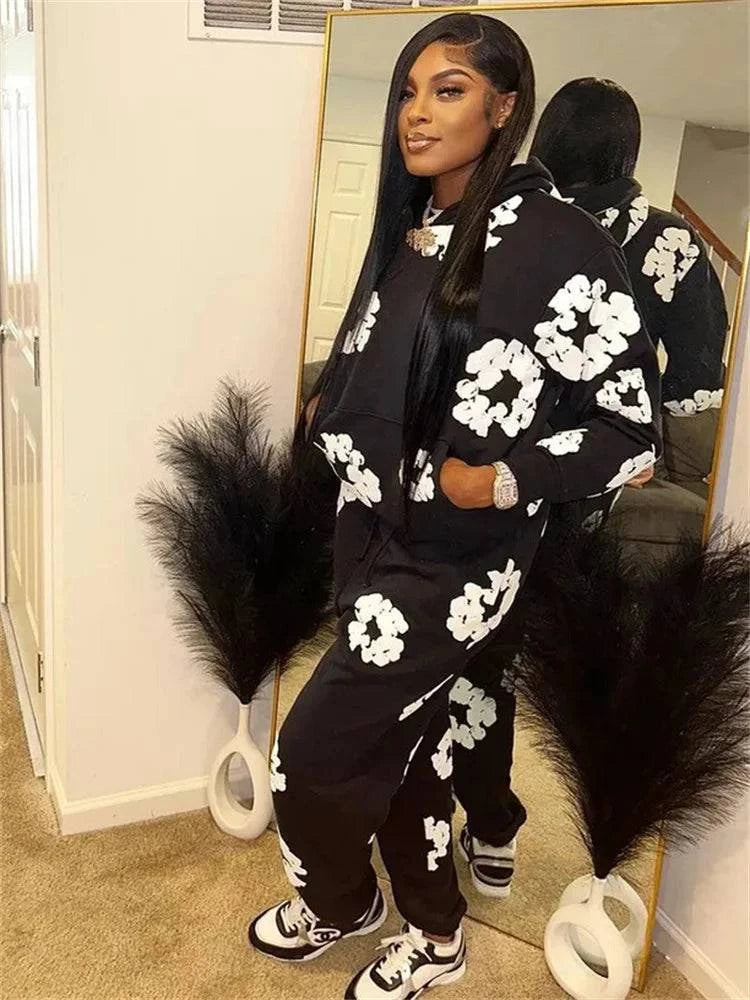 Women's Two Piece Hoodies Fashion Long Sleeve Elastic Waist SetsEnhance your style with our Women's Hoodie and Pants Set! Perfect for any occasion, this fashionable duo elevates your look with its long sleeve hoodie and elastic wSweatsuitPlush Fashions Shop Plush Fashion Shop