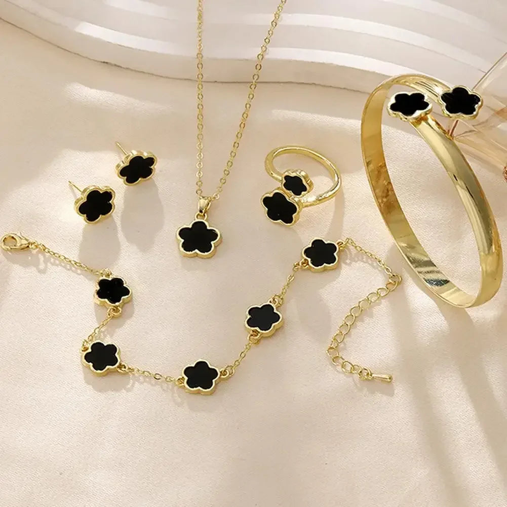 Plum Blossom Plant five leaf necklace and earring set with floral design, crafted by Plush Fashion Hub.