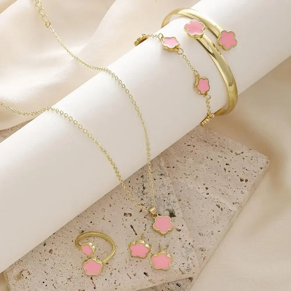 Plum Blossom Plant five leaf necklace and earring jewelry set with floral design by Plush Fashion Hub.