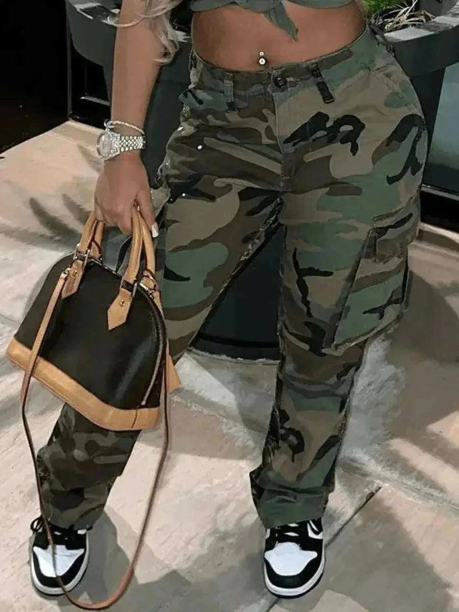 Camo Print Side Pocket Cargo Pants For WomenBe bold and confident with these Camo Print Side Pocket Cargo Pants for Women! Designed with a camouflage print and side pockets, these pants are both stylish and fuPantsPlush Fashions ShopPlush Fashion Shop