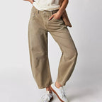 Women's Y2K baggy mid-waist wide-leg jeans by FitiqueFit, casual 90s streetwear style with relaxed fit and wide-leg design.