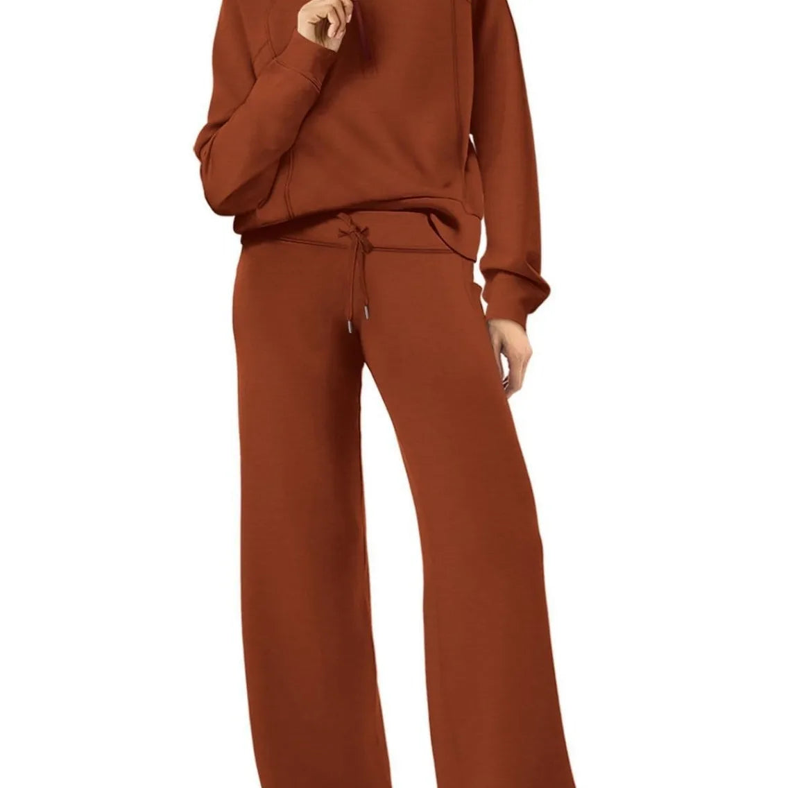 Women two-piece sweatshirt and wide-leg pants set by Plush Fashion Hub, featuring comfortable casual loungewear in a coordinated style.