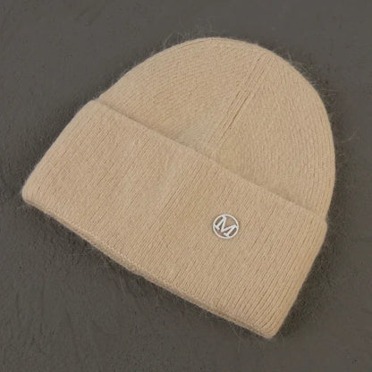 Women solid color fur knitted bonnet, warm ski beanie made from soft rabbit material, ideal for winter comfort.