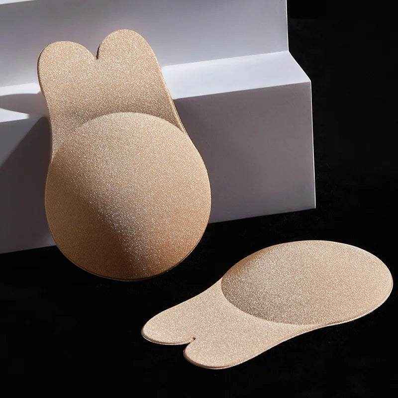 Silicone adhesive push-up bra with reusable breast lift tape, strapless design, breathable material, rabbit ear shape.