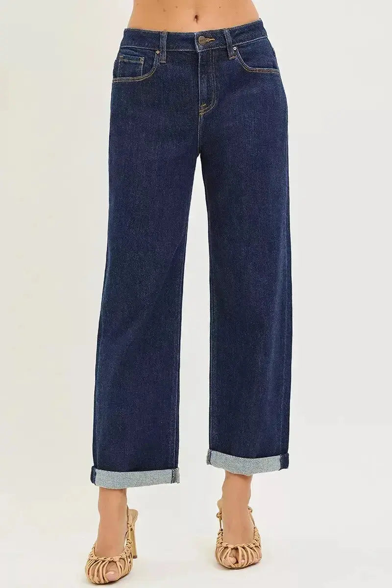 Slouchy cropped boyfriend jeans with cuffed hem by Plush Fashion Hub, showing relaxed fit and distressed denim style.