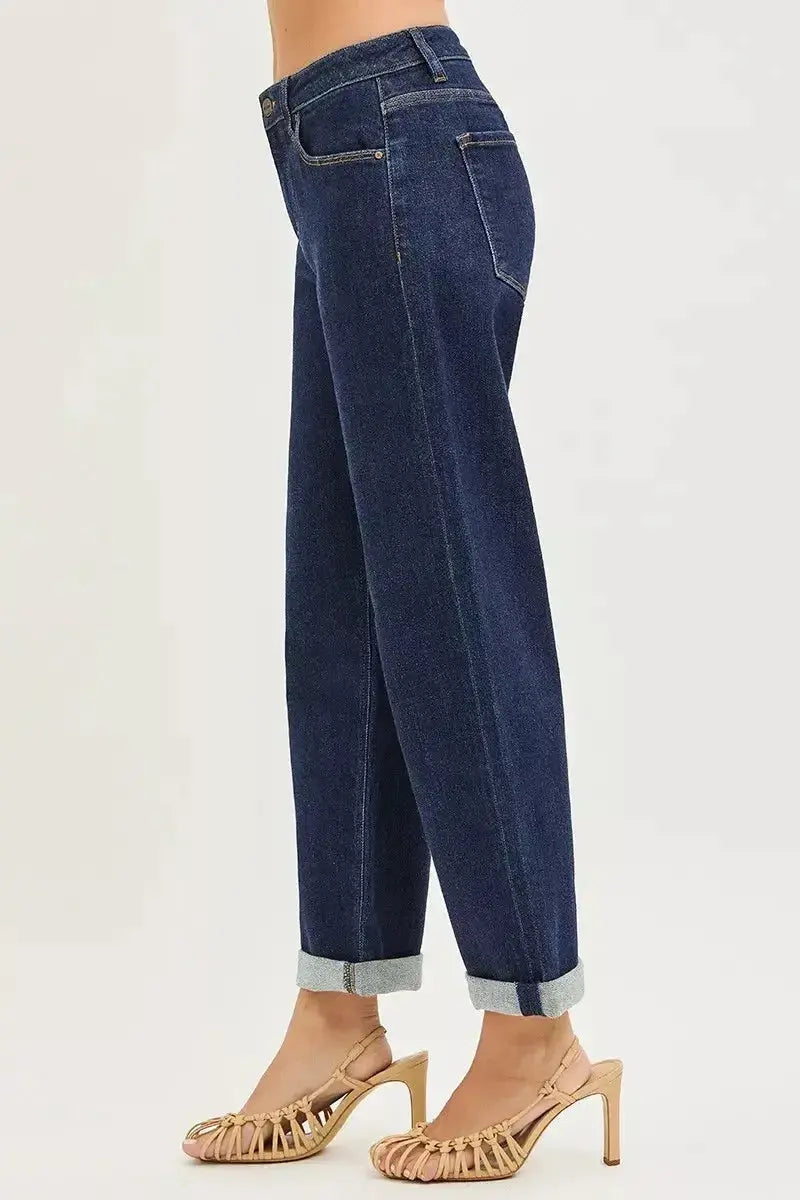 Slouchy cropped boyfriend jeans with cuffed hem by Plush Fashion Hub, featuring relaxed fit and distressed details.