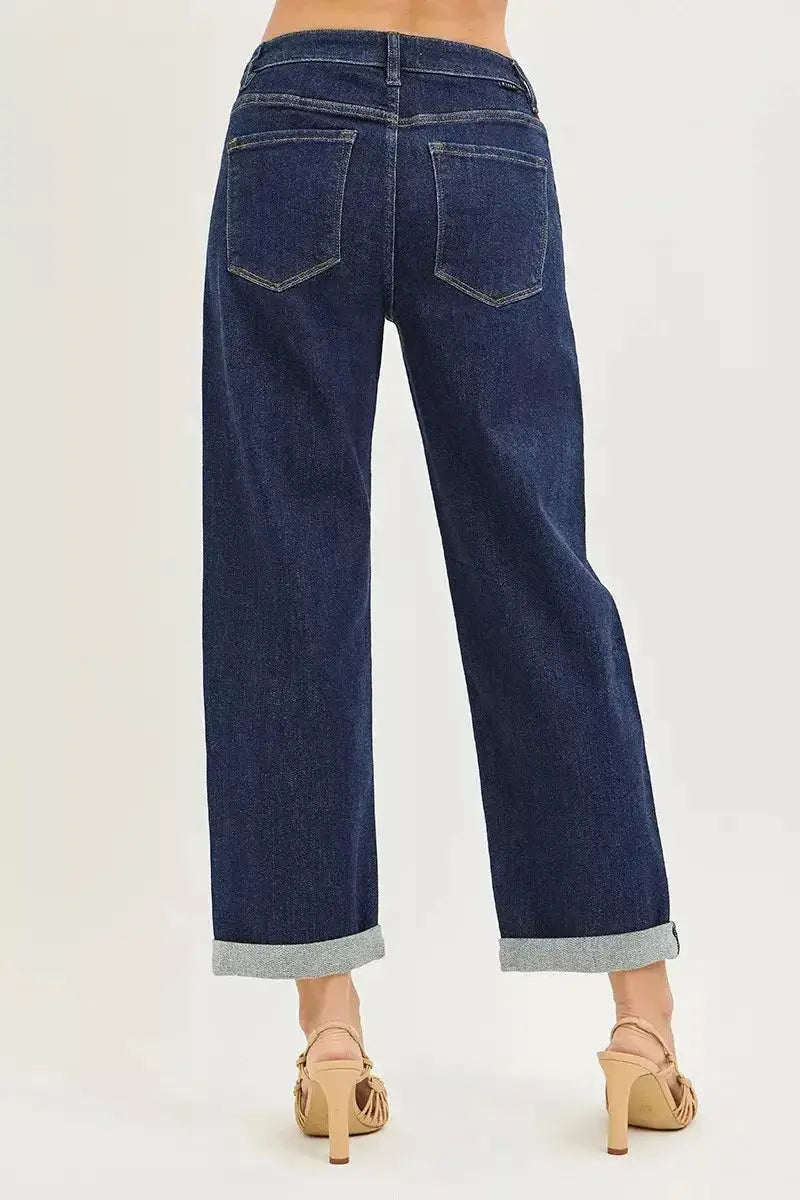 Slouchy cropped boyfriend jeans with cuffed hem by Plush Fashion Hub, showcasing relaxed fit and stylish distressed details.