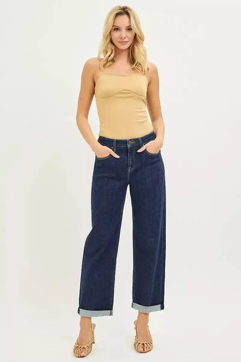 Slouchy cropped boyfriend jeans with cuffed hem from Plush Fashion Hub, casual denim style with relaxed fit and rolled cuffs.