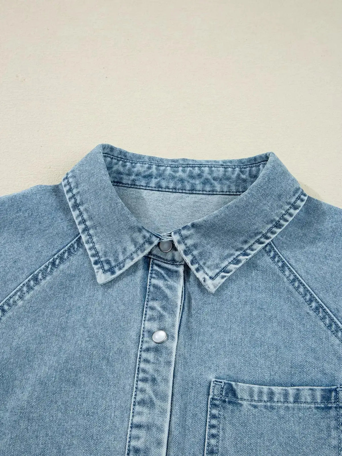 Plush Fashion Hub smocked cuff flared denim shirt mini dress with casual button-down front and stylish jean fabric.