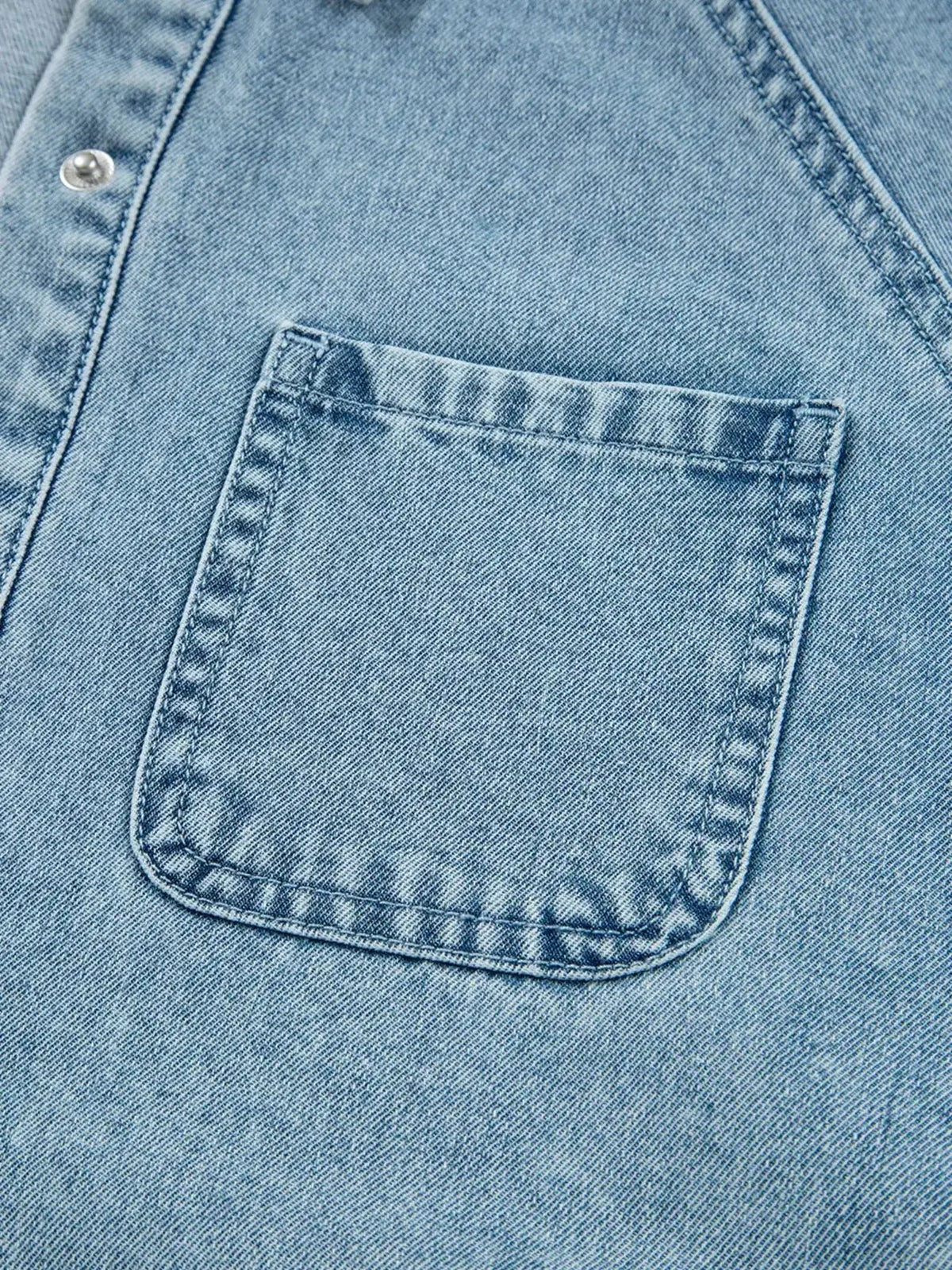 Smocked cuff flared denim shirt mini dress by Plush Fashion Hub, featuring casual button-down style and trendy jean fabric.