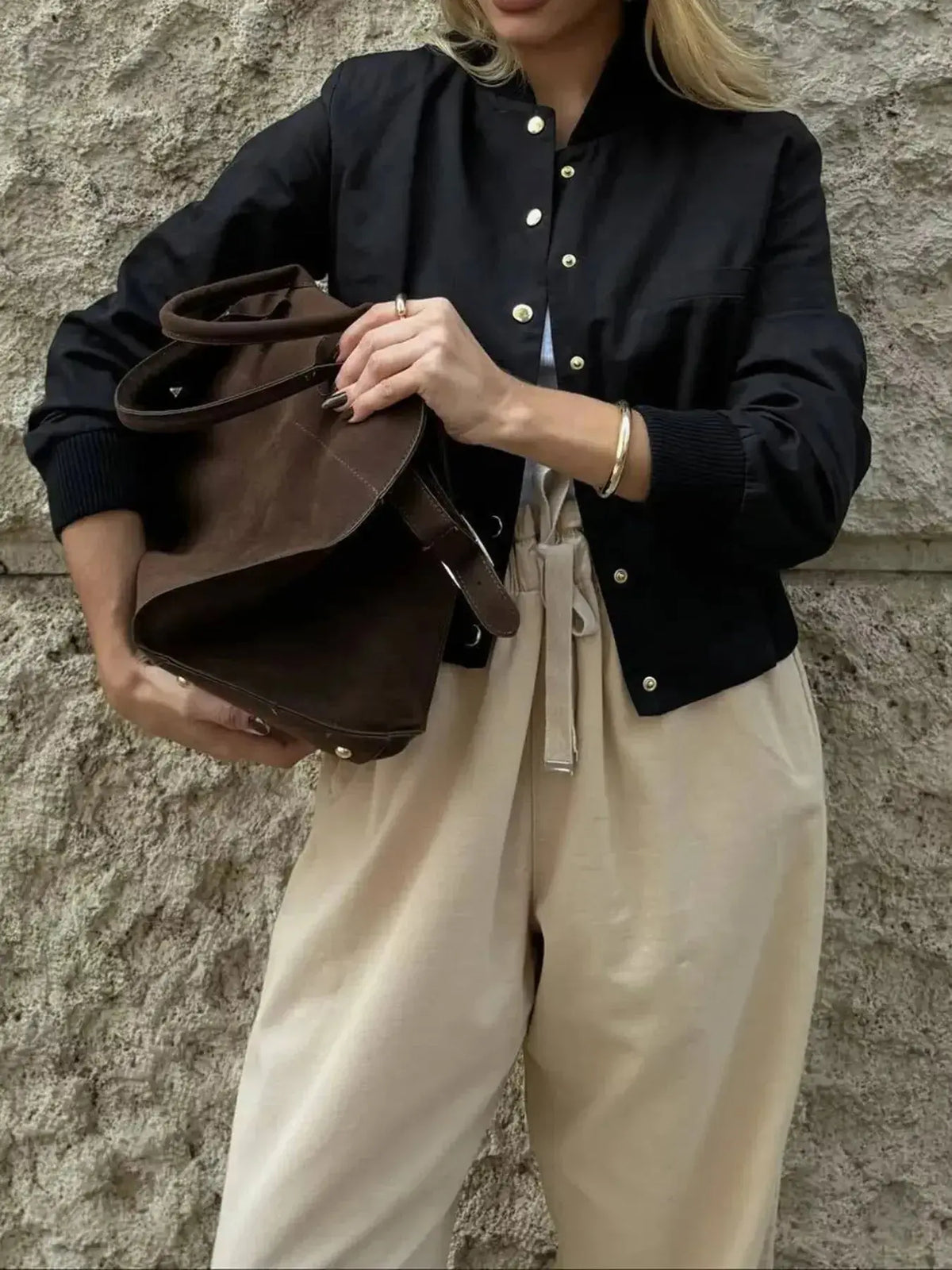 Lightweight women's cropped bomber jacket with snap buttons, stylish outerwear from Plush Fashion Hub, shown in a trendy design.