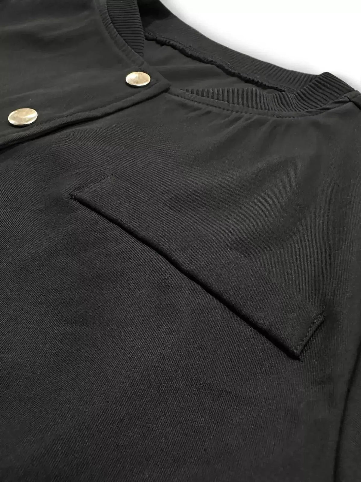 Women's lightweight cropped bomber jacket with snap buttons by Plush Fashion Hub, shown in a stylish outerwear design.