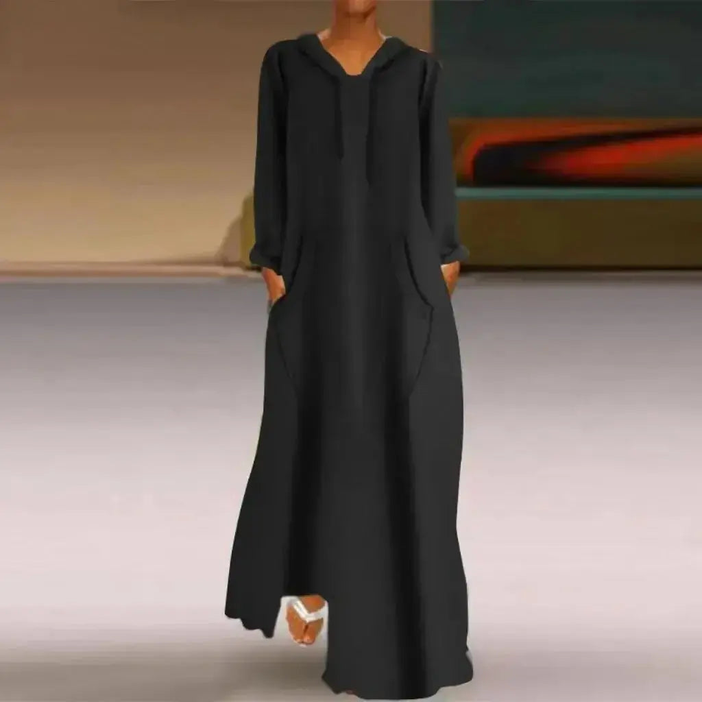 Women's relaxed fit long hooded sweatshirt by Plush Fashion Hub, solid color, cozy casual pullover with a comfortable fit.