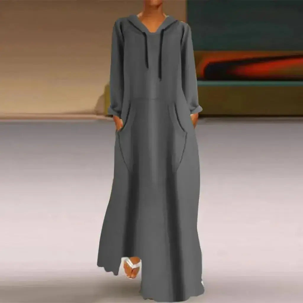 Women's relaxed fit long hooded sweatshirt by Plush Fashion Hub, solid color, cozy casual pullover with a comfortable fit.