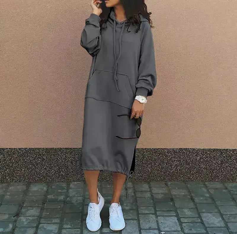 Women's long sleeve hooded sweatshirt from Plush Fashion Hub, cozy oversized tunic top with drawstring hood in solid color.