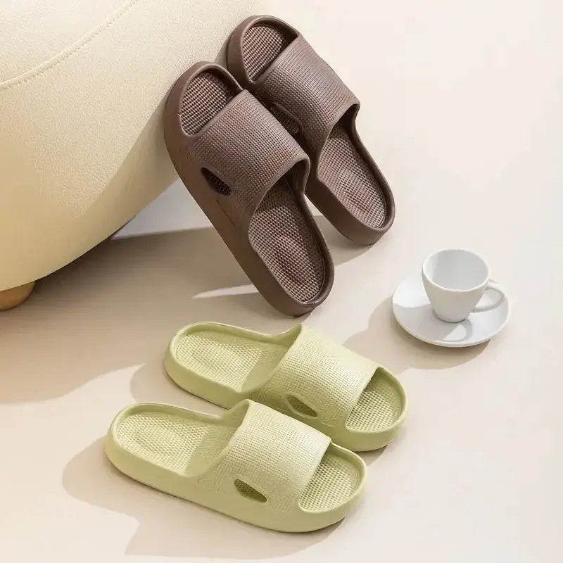 Unisex thick sole non-slip EVA bathroom slippers in solid color, lightweight indoor slides by Plush Fashion Hub.