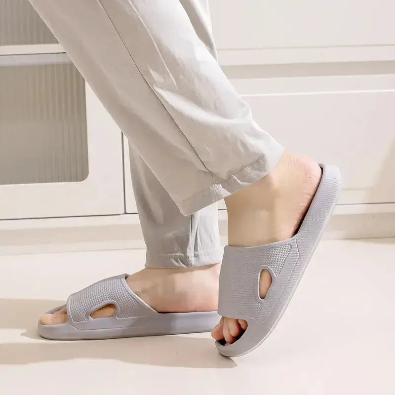Unisex thick sole EVA bathroom slippers with non-slip soles, solid color indoor slides by Plush Fashion Hub.