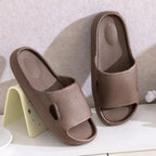 Plush Fashion Hub unisex bathroom slippers with thick soles, non-slip EVA material, solid color for indoor use.
