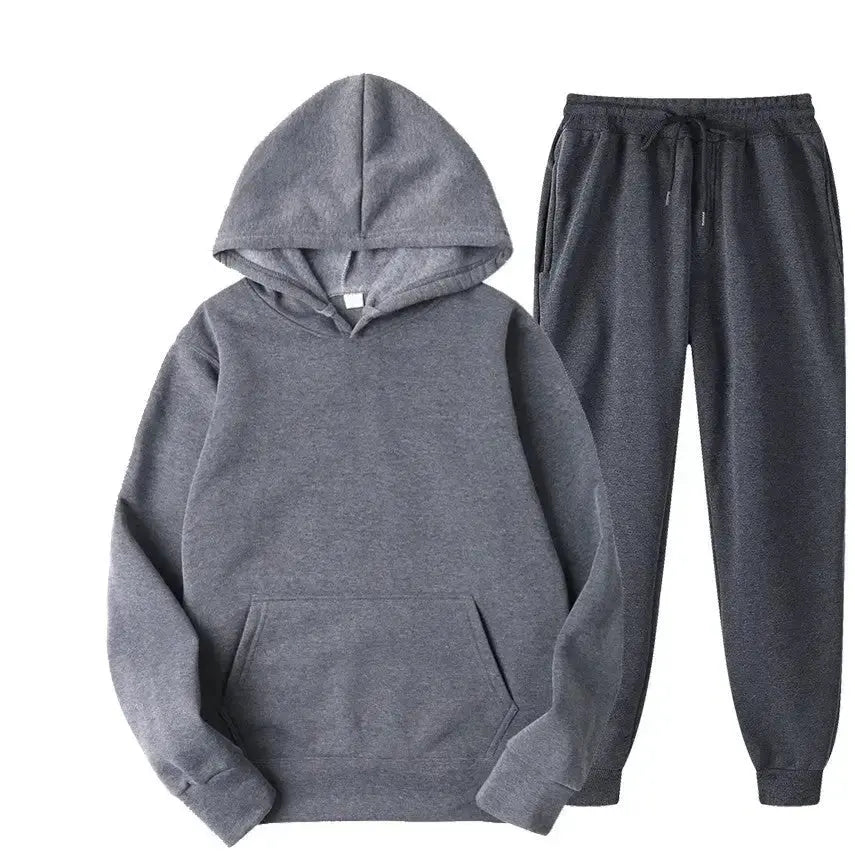 Oversized women's hooded sweatshirt and jogger lounge set in soft polyester fabric, from Plush Fashion Hub.