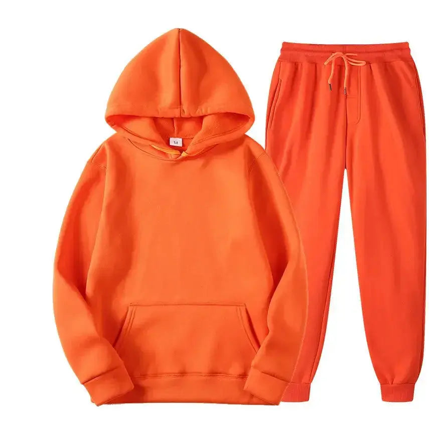 Oversized women's hooded sweatshirt and jogger lounge set in soft polyester with sparkling fabric detail, by Plush Fashion Hub.