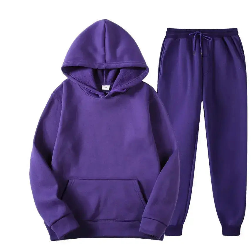 Oversized women's hooded sweatshirt and jogger lounge set in soft polyester fabric, from Plush Fashion Hub.