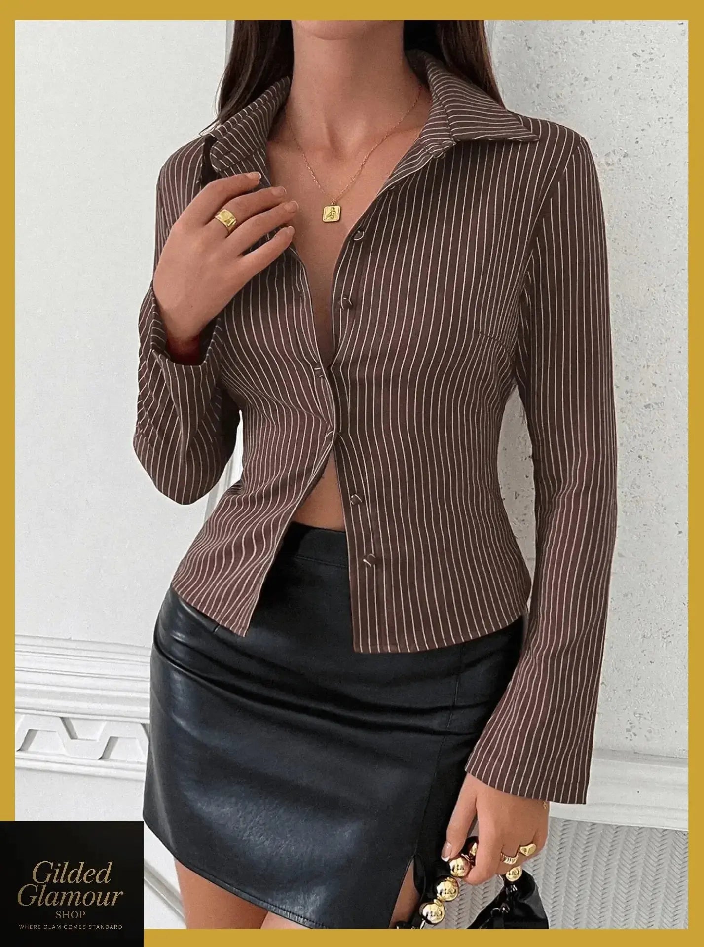 Striped long sleeve button-up shirt by Plush Fashion Hub, featuring classic design and versatile stretch fabric for workwear or casual wear.