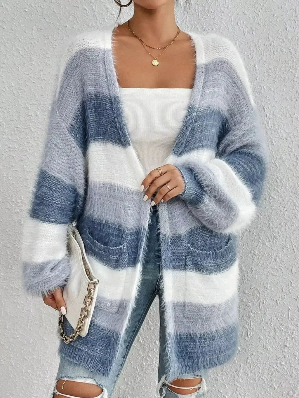 Striped fuzzy knit open front cardigan with pockets from Plush Fashion Hub, cozy layering sweater for casual wear.