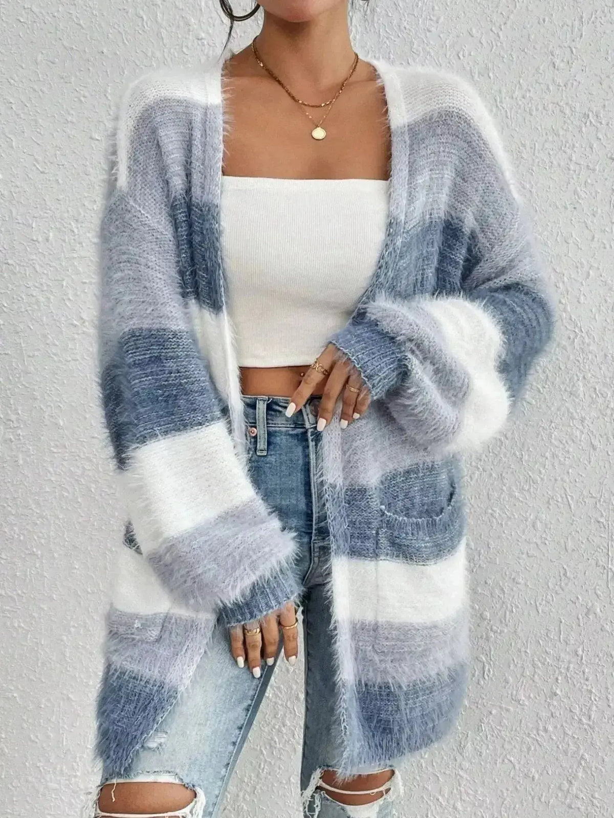 Cozy striped fuzzy knit open front cardigan with pockets from Plush Fashion Hub, perfect for casual layered looks.