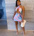 Rainbow tie-dye halter bodycon mini dress for women, featuring vibrant colors and a fitted silhouette, stylish and trendy.
