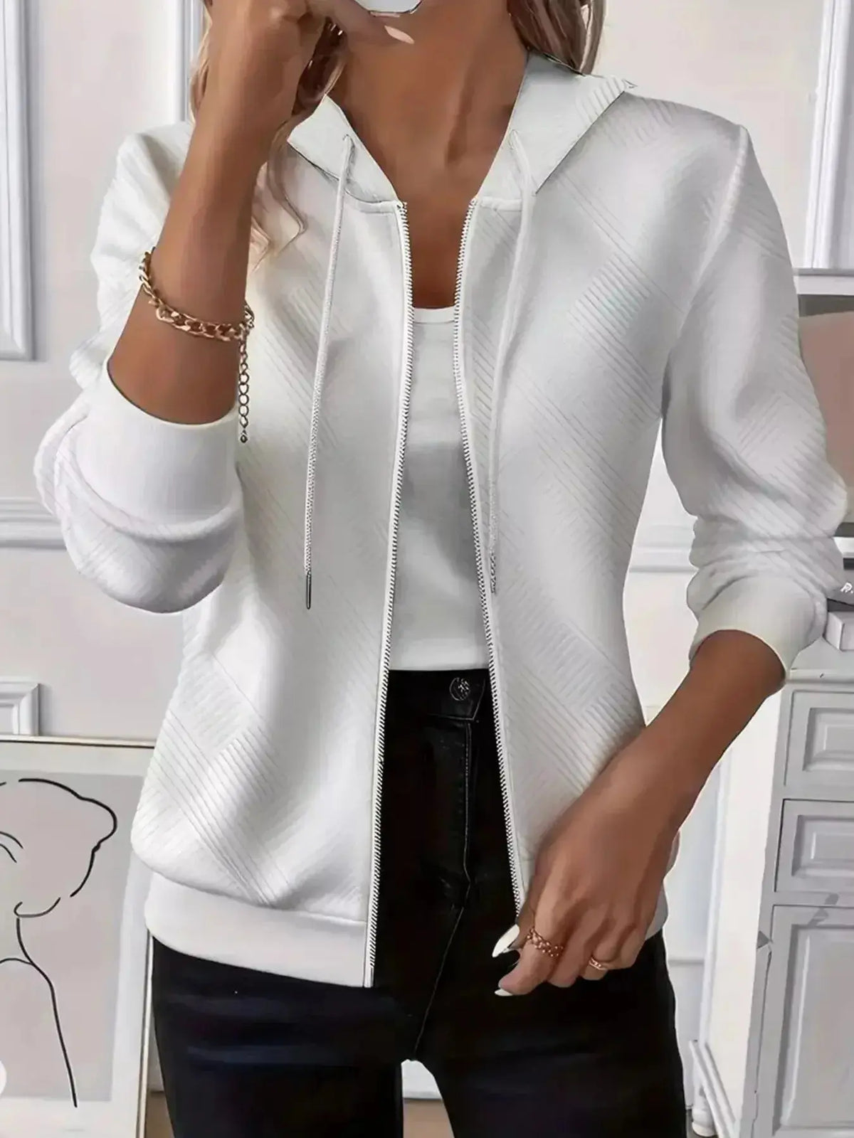 Women’s textured zip-up hoodie with adjustable drawstring from Plush Fashion Hub, featuring a cozy, stylish design.