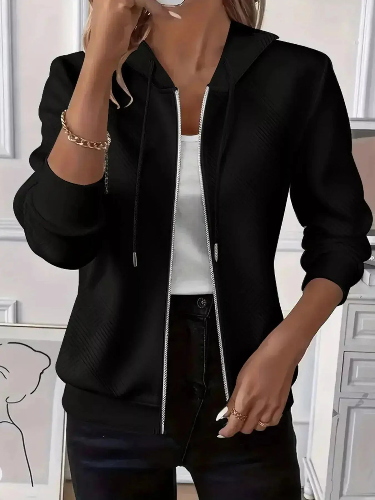 Women’s textured zip-up hoodie with adjustable drawstring from Plush Fashion Hub, shown with a cozy, soft fabric and front zipper.