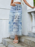 Denim tiered ruffle patchwork skirt with belt by Trendsi, featuring layered ruffles and a stylish waist belt for a trendy look.