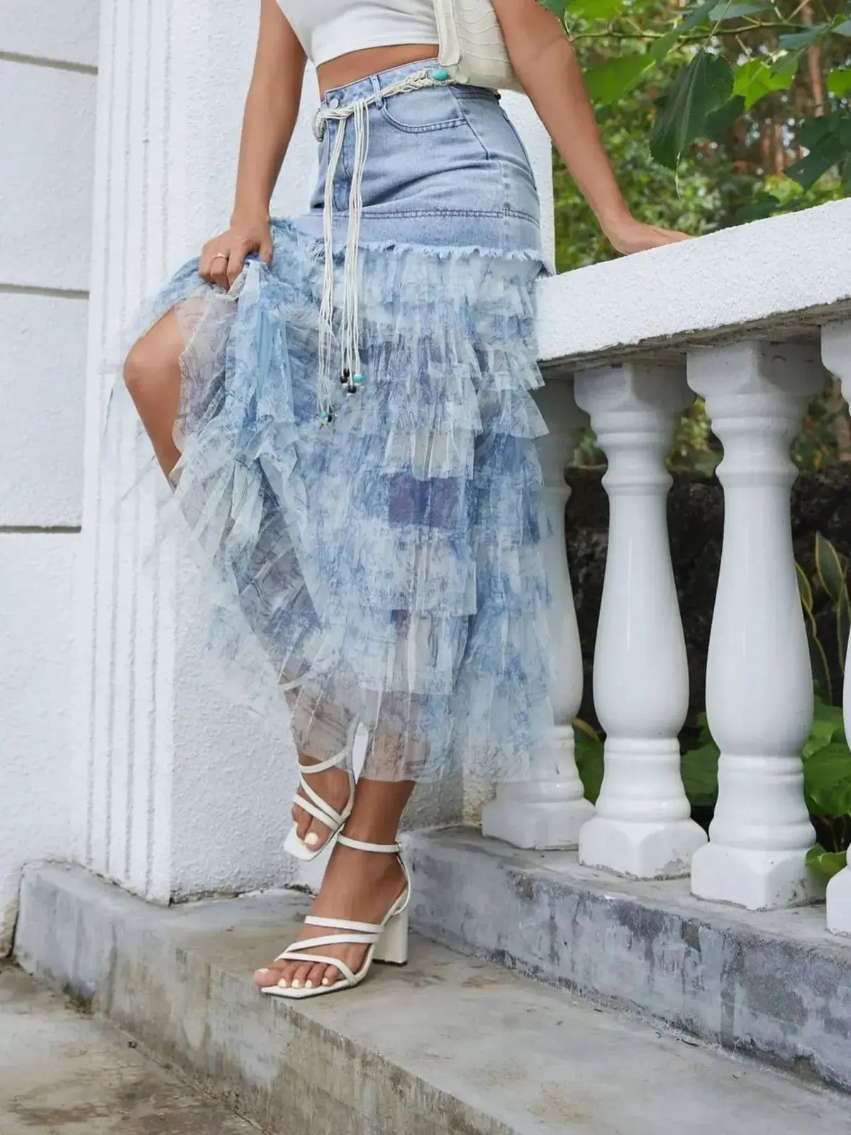 Denim tiered ruffle patchwork skirt with belt by Plush Fashion Hub, featuring layered ruffles and stylish patchwork design.