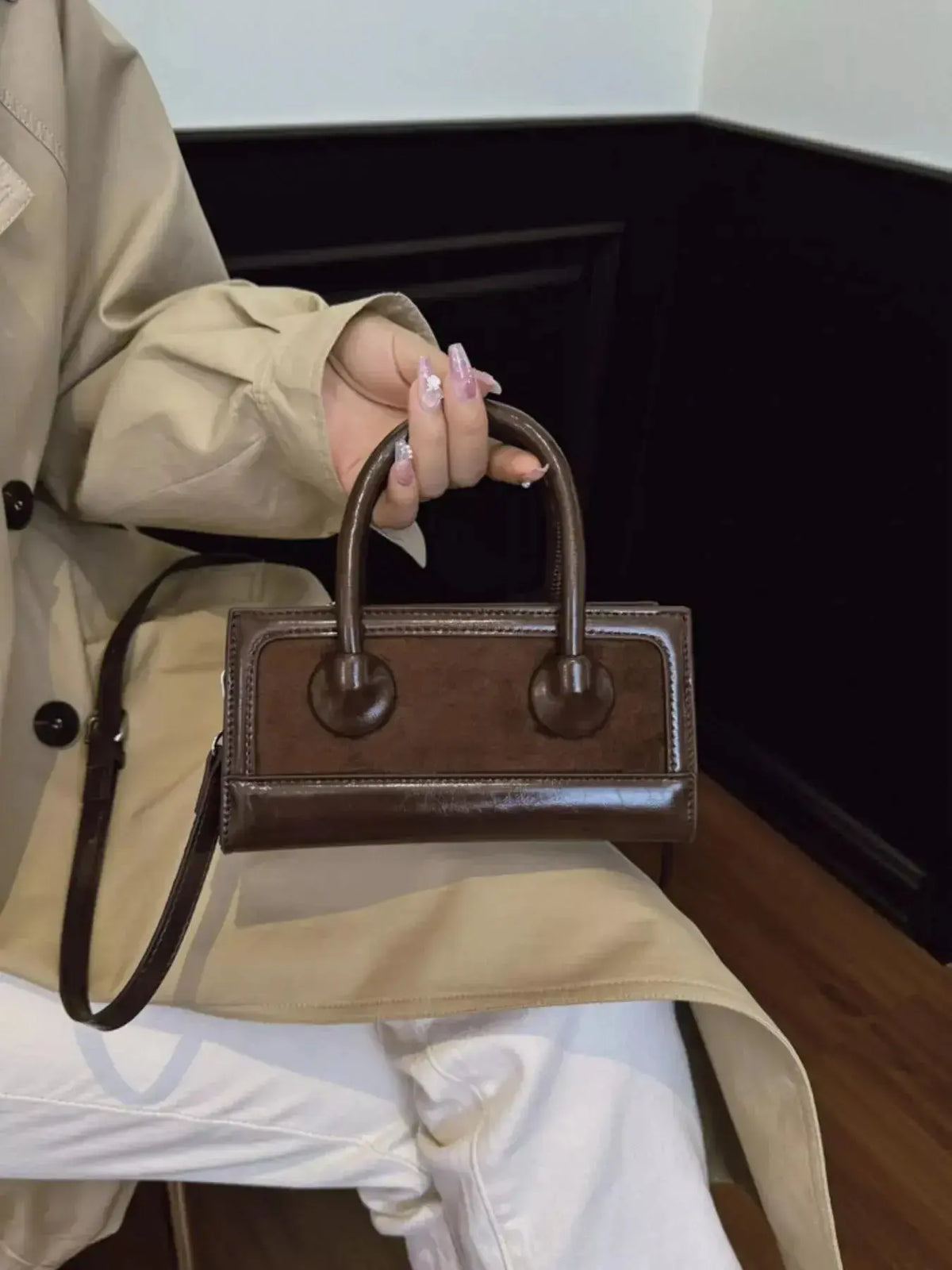 Structured premium leather crossbody bag with top handle from Plush Fashion Hub, featuring a sleek, elegant handbag design.