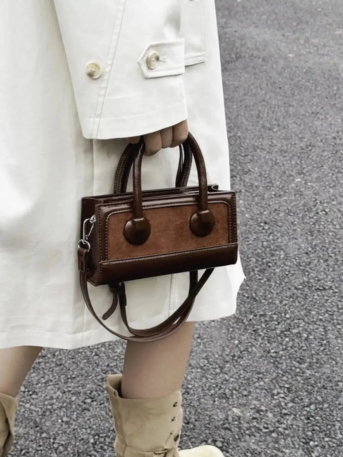 Structured leather top-handle crossbody bag by Plush Fashion Hub, featuring a sleek design and durable straps for versatile style.