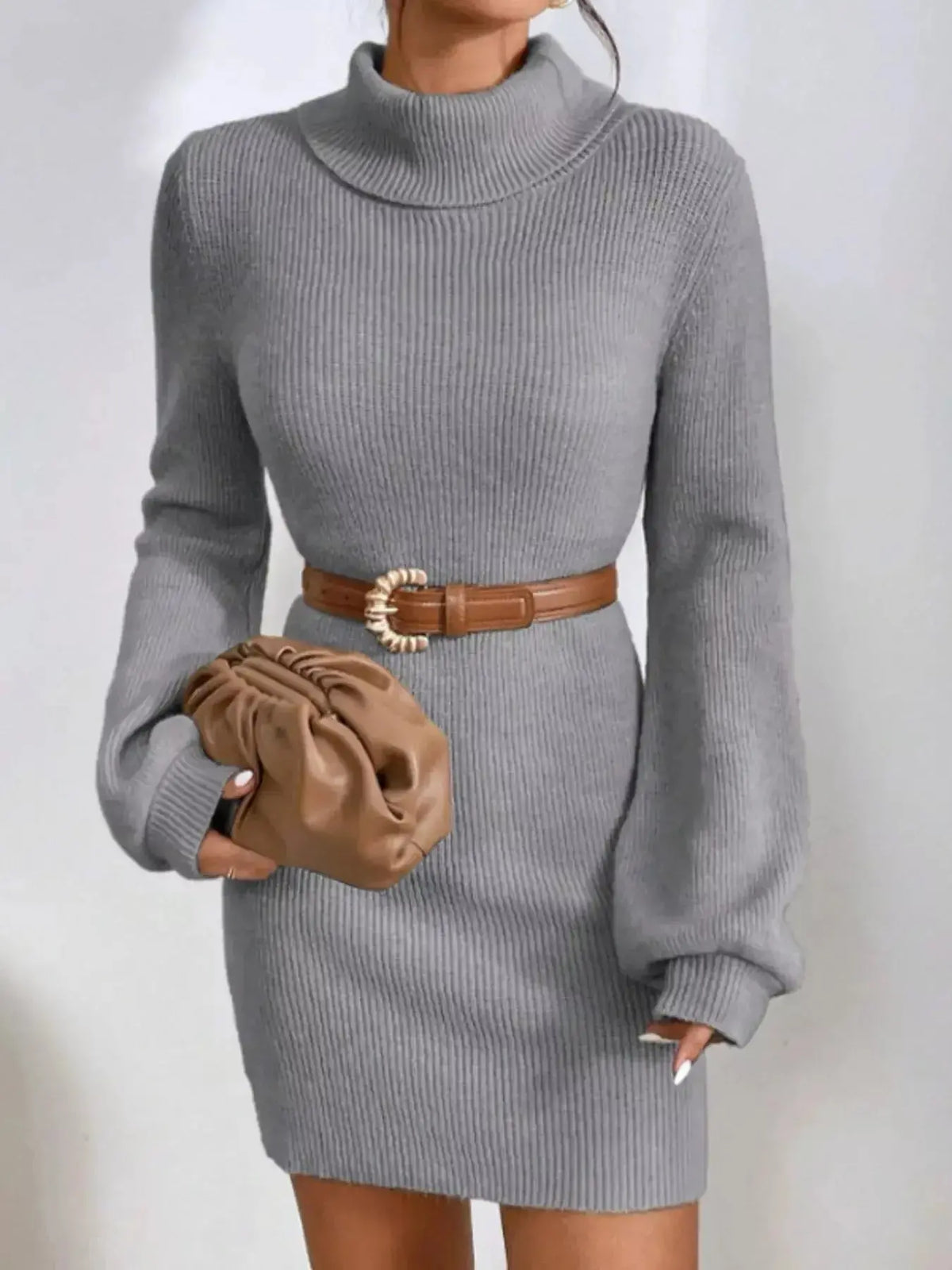 Women's ribbed knit turtleneck midi sweater dress with long sleeves from Plush Fashion Hub, shown on a model.
