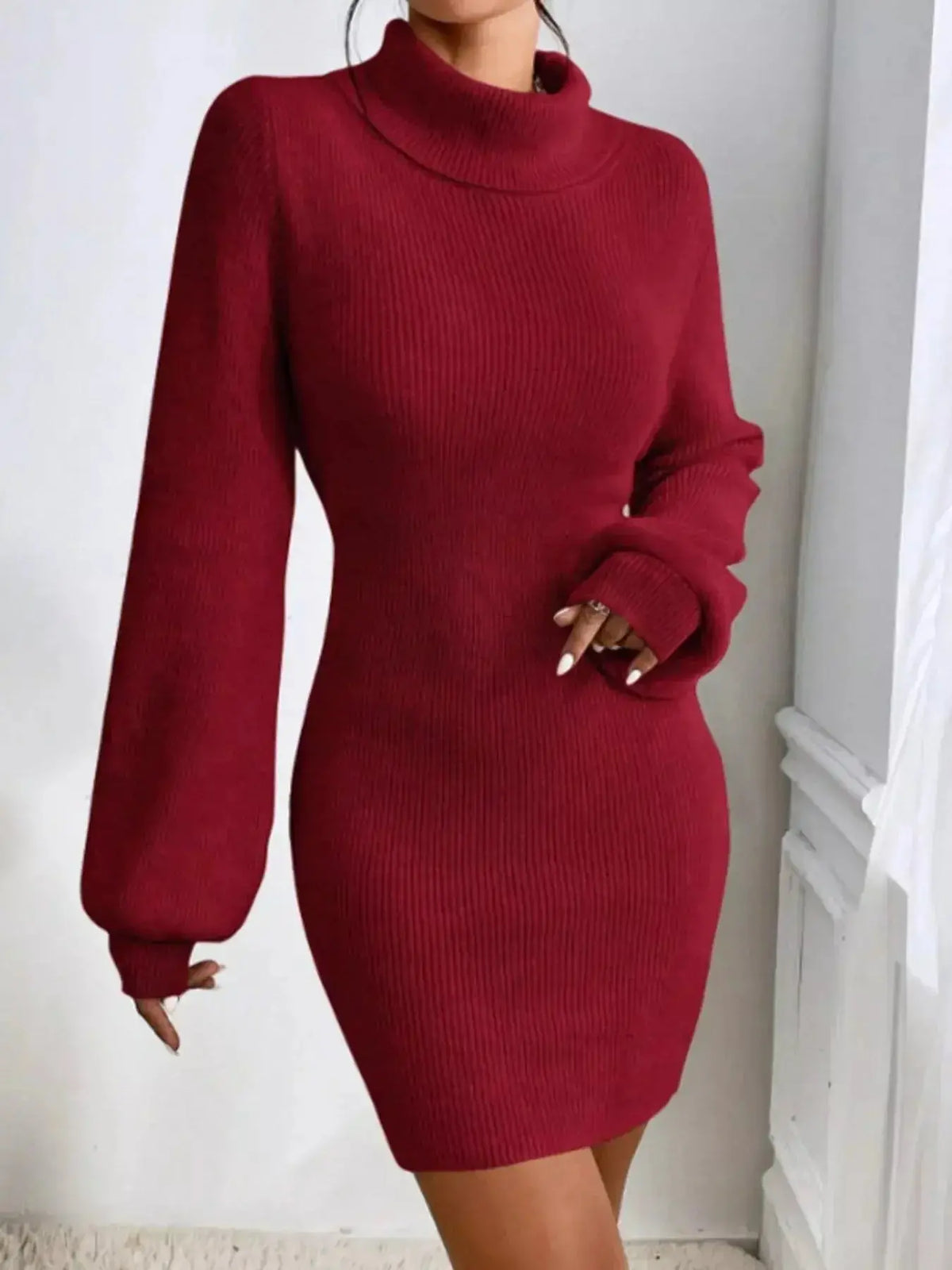 Women's ribbed knit turtleneck midi sweater dress with long sleeves from Plush Fashion Hub, shown on a model.