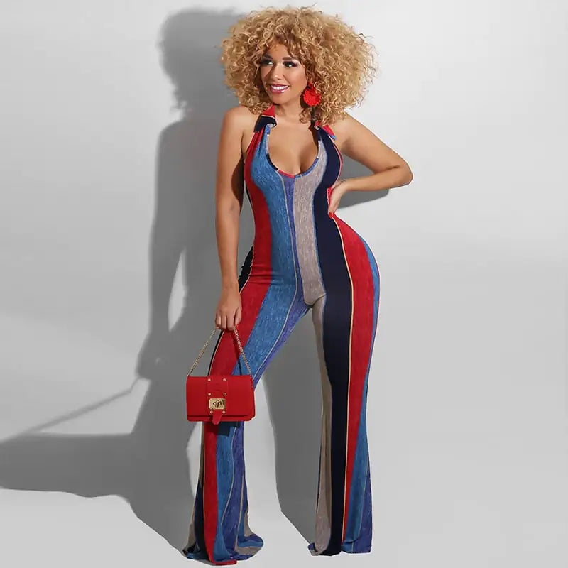 Women’s striped halter jumpsuit with horn details, stylish and bold, from Trendy Attic Store01, shown in a fashion-forward pose.